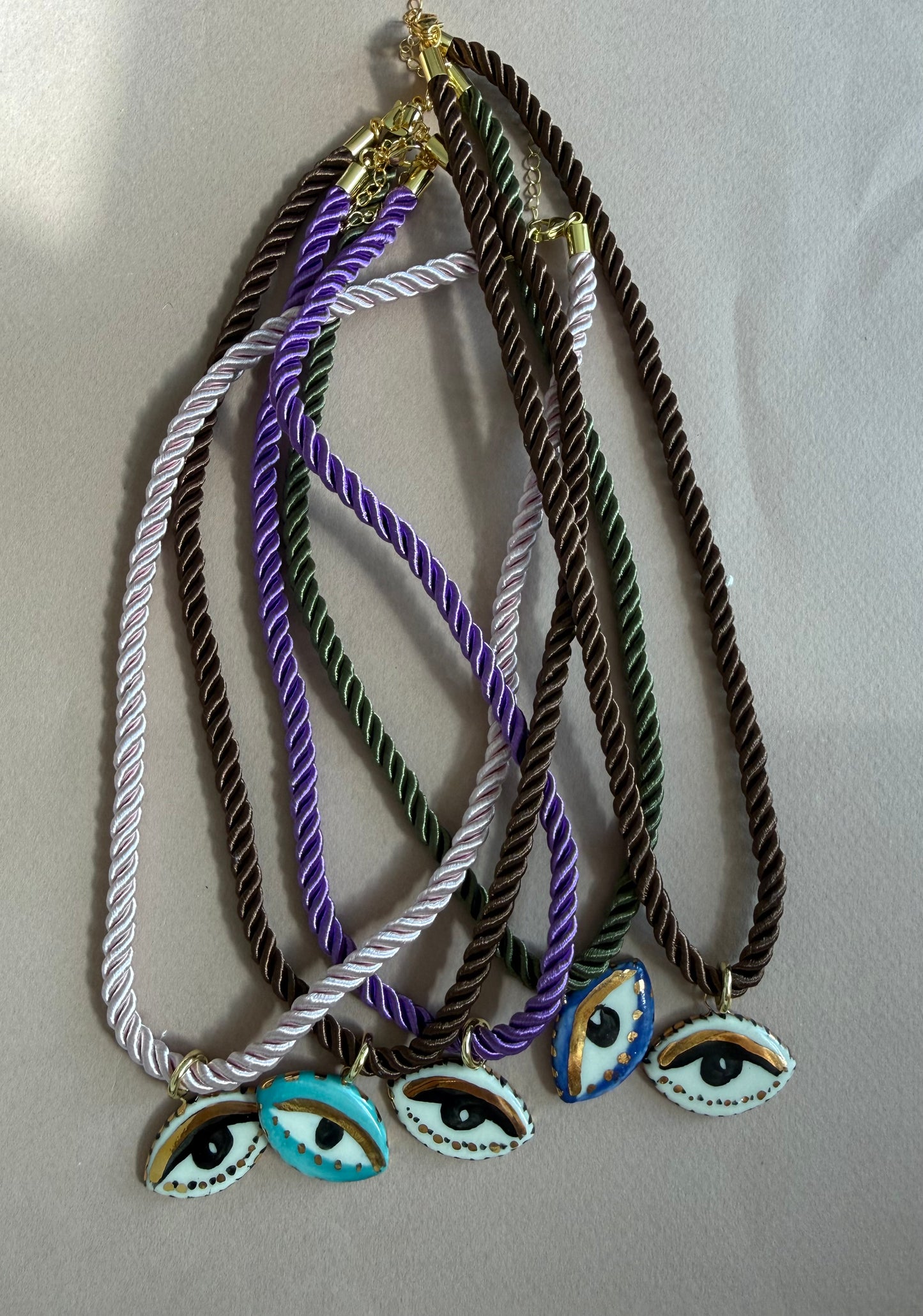 CERAMIC NOT SO EVIL EYE SILK ROPE NECKLACE