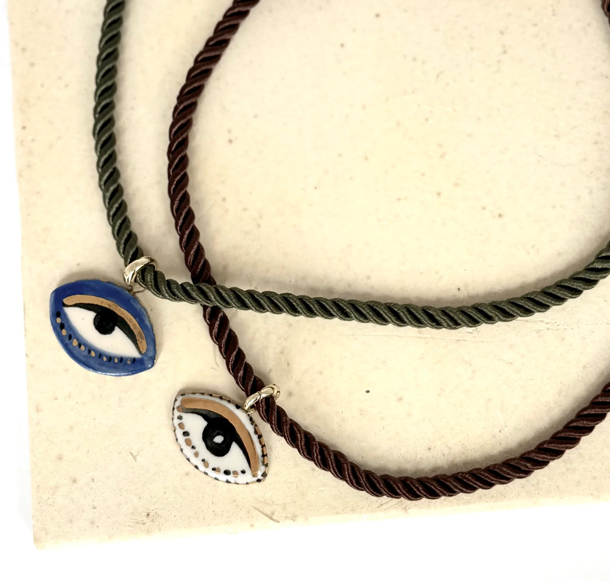 CERAMIC NOT SO EVIL EYE SILK ROPE NECKLACE